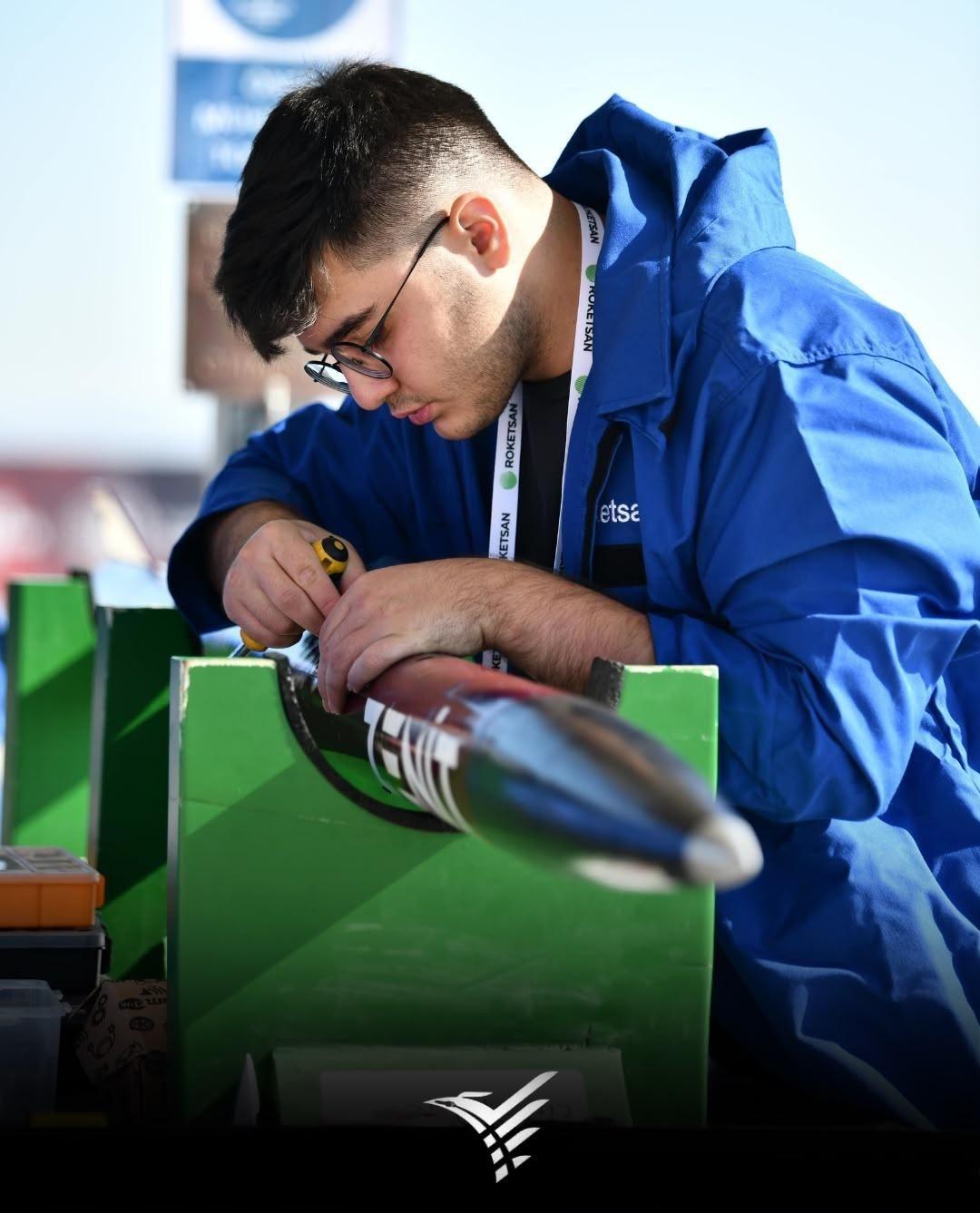 Final checks on the nose cone before launch